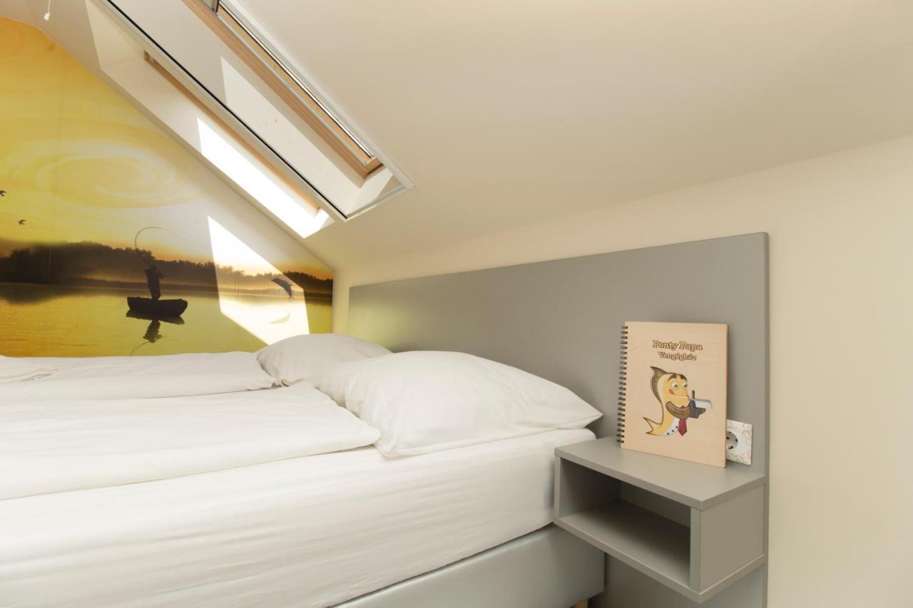 Ponty-Papa Rendezvenyhaz Aparthotel Dávod Eksteriør bilde